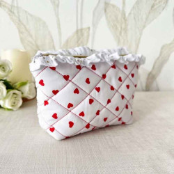 Trousse de toilette matelassée à volants double gaze